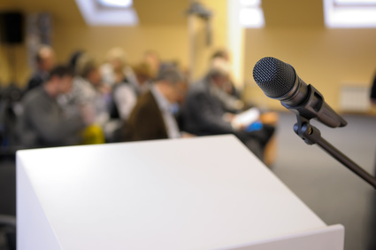 Microphone stand at conference. Microphone stand by lectern at conference.